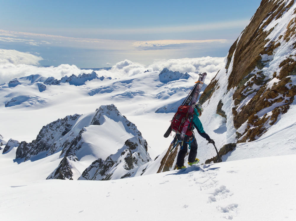 Preparing to downclimb the top of the West Face