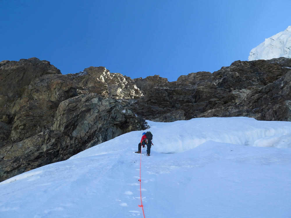 Climbing the couloir above the campsite