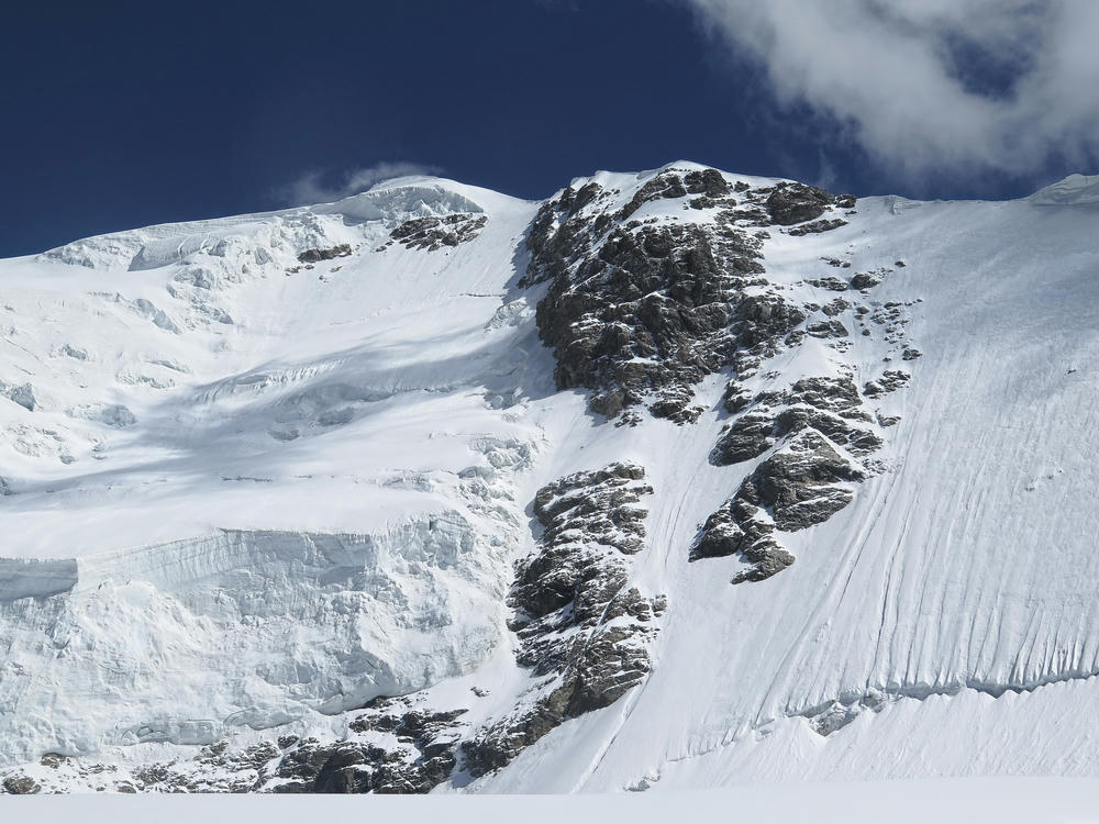 West Face of Tetnuldi. Up the couloir in the center, and tending left to the ridge top.
