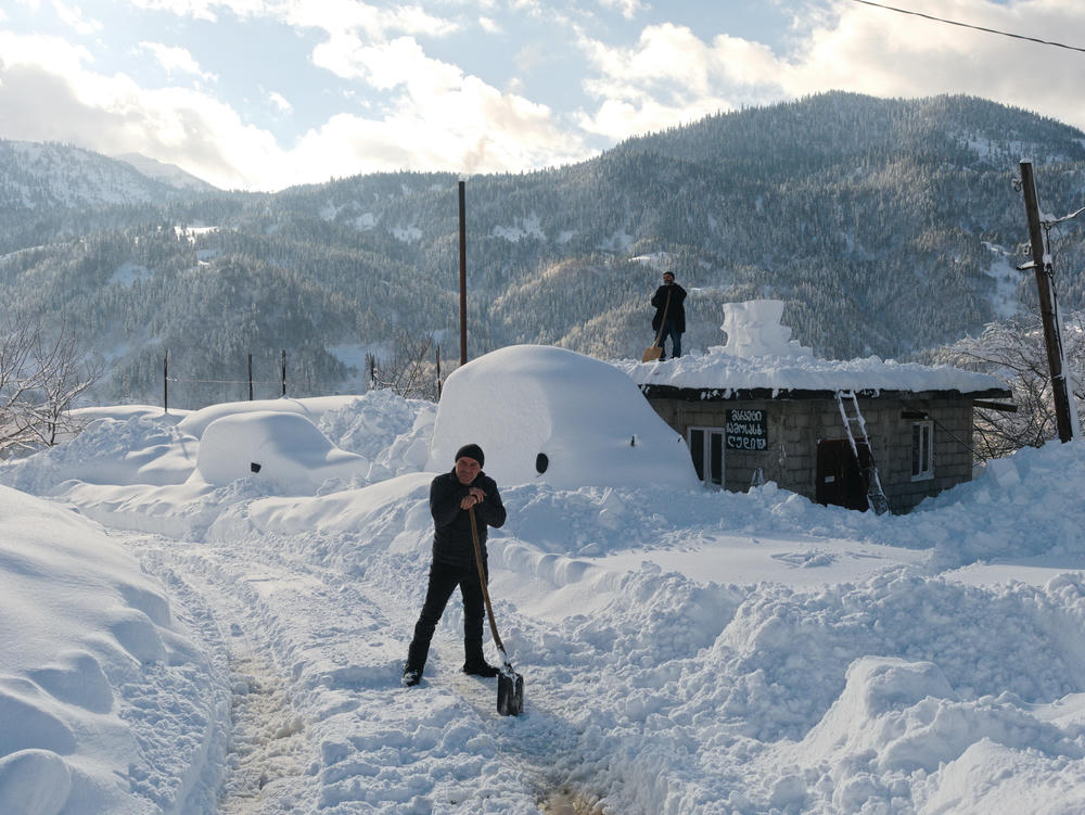 Clearing snow in a village near Goderdzi